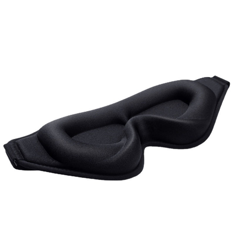Three-quarter view showing the deep 3D moulded eye cups of the black DeepRest sleep mask